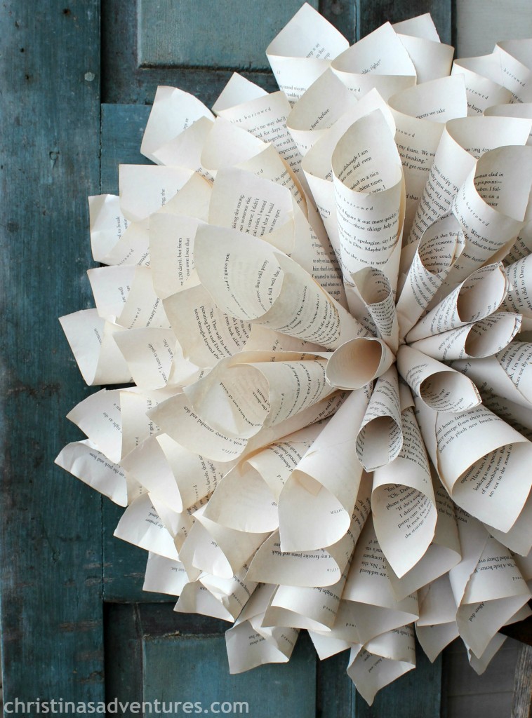close up rolled book page wreath