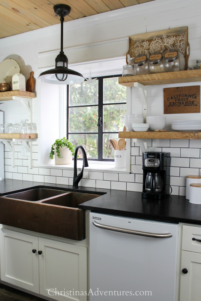 farmhouse kitchen design with matte black granite counter tops