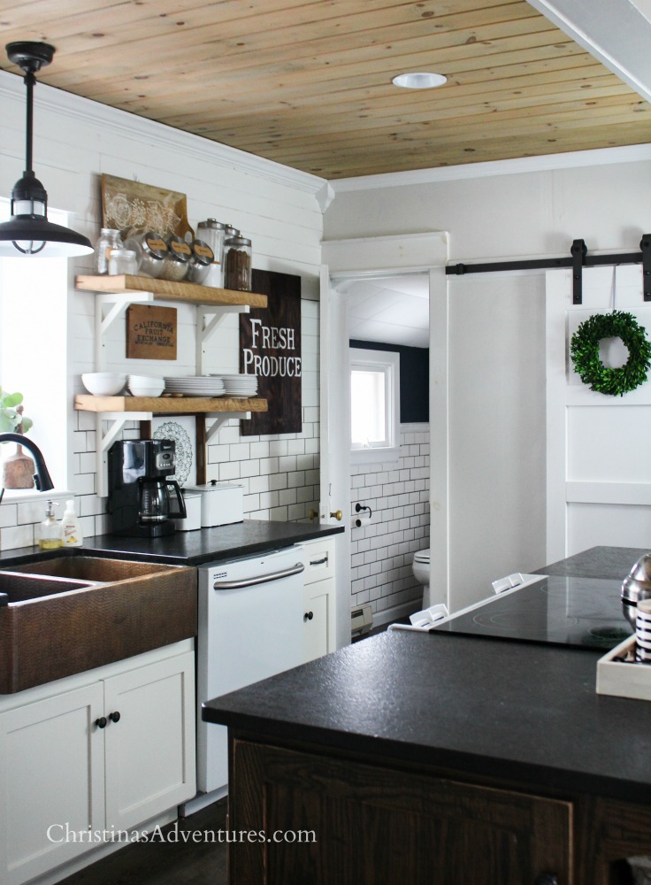 farmhouse kitchen with leathered granite counter tops