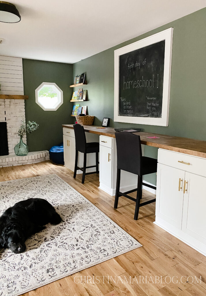 built in desk with chalkboard white cabinets butcher block counter book ledges
