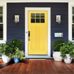 yellow front door with dark house