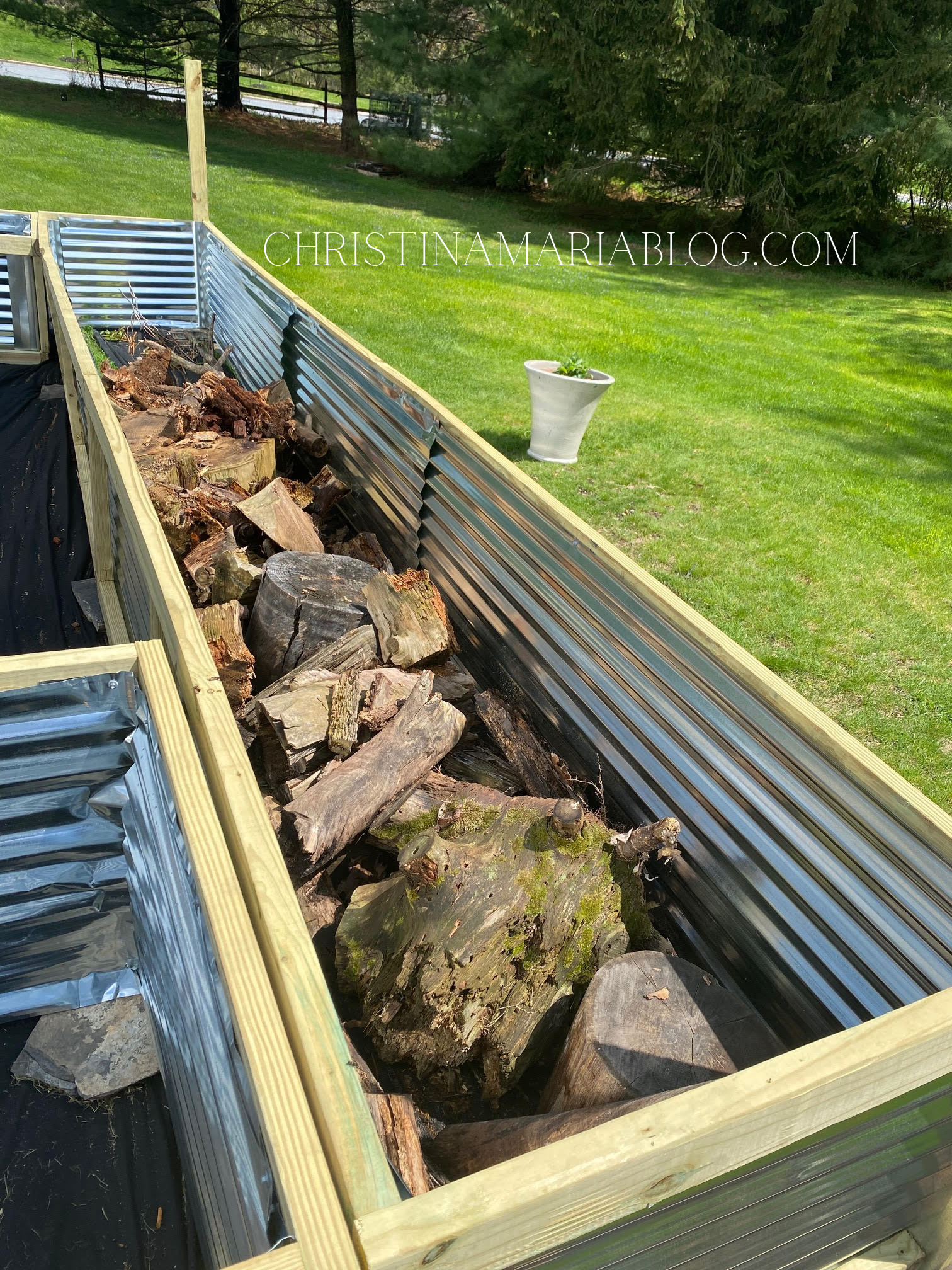How to fill raised garden beds without spending a lot of money - Christina Maria Blog