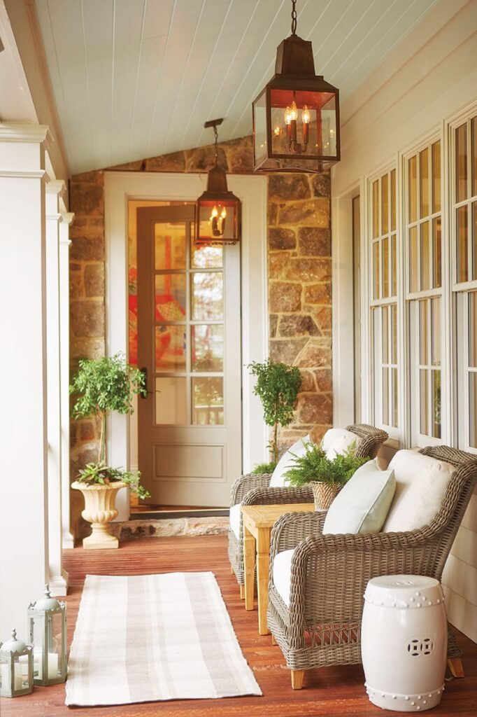 taupe door side porch stone exterior