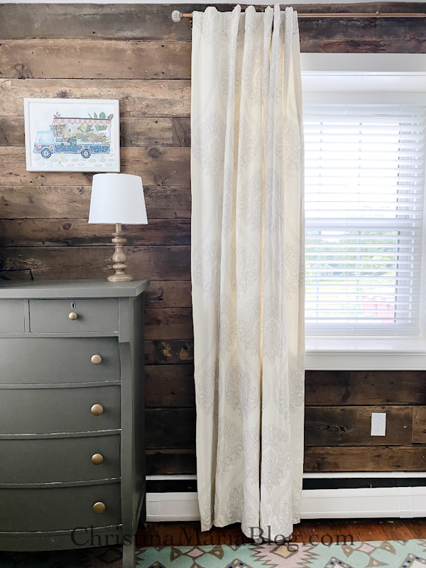 shiplap reclaimed wood plank wall olive green dresser ivory curtains