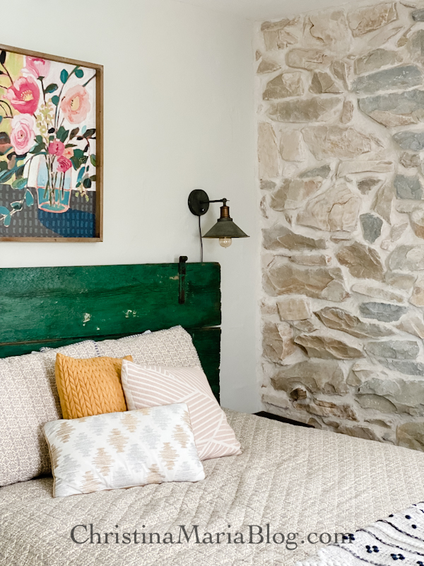 stone wall farmhouse reclaimed wood headboard green
